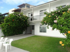 Casa pé na areia